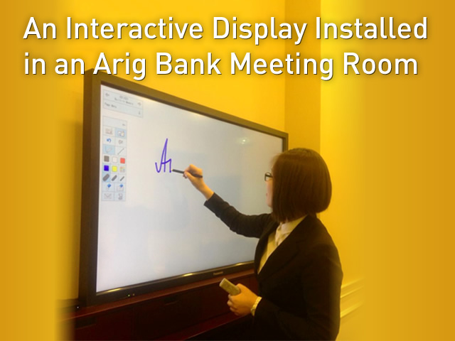 An Interactive Display Installed in an Arig Bank Meeting Room